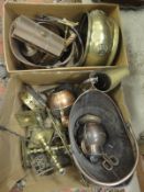 Two boxes of various brass and copper wares to include a pair of brass stirrups, coal helmets,