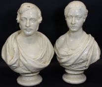 A pair of cream painted plaster busts of the young Queen Victoria and Prince Albert,