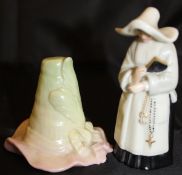 A Royal Worcester candle snuffer "The Nun" date marked for 1931,