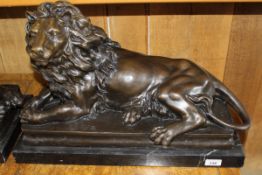 AFTER ANTOINE LOUIS BARYE "Recumbent male lion", bronze, with chocolate brown patination,