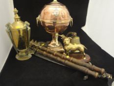 An early 19th Century copper and brass mounted tea urn of globular form,