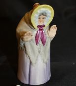 A Royal Worcester candle snuffer "Granny snow" date marked for 1922