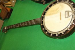 A late Victorian 5½ string banjo,