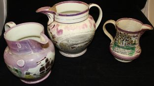 Three various Sunderland lustre jugs CONDITION REPORTS Small jug - wear to the pink