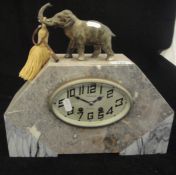 An Art deco marble cased mantel clock, the eight day movement with oval dial and Arabic numerals,