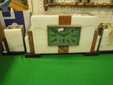 An Art Deco alabaster and marble cased clock garmature