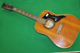 An Eko Ranger XII 12 string guitar with original label to interior and emblazoned finger plate No'd