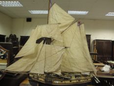 A 20th Century hand built "Speedy" circa 1828 naval cutter model on stand