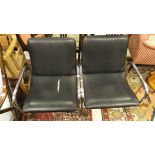 A pair of modern and office chairs in the manner of Herman Miller,