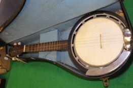 A circa 1900 ukelele banjo with case