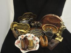 A box of sundry metal and treen ware to include three various pulley blocks, oil lamp,