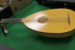 A moden maple lute by Stanley Doubtfire,