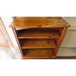 A modern pine adjustable shelf bookcase,