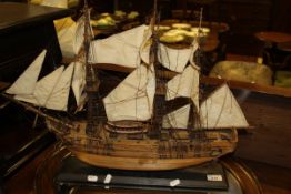 A mid 20th Century hand built model of a three masted sailing vessel on stand