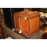 A modern mahogany and cross banded cutlery cabinet in the Regency style,