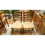A set of eight Bylaw oak ladderback chairs with upholstered seats
