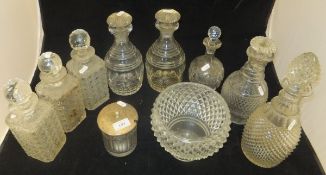 A collection of eight various cut glass decanters,