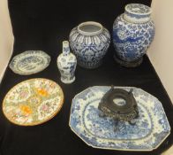 A collection of Chinese blue and white wares including a dragon decorated jar and cover,