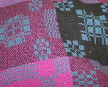 A Welsh blanket in purple,