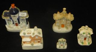 A Staffordshire pottery cottage money box, pastille burner,