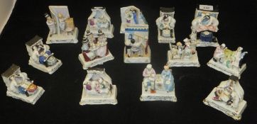 A collection of 14 various late 19th Century German porcelain fairings including "Who is coming?",