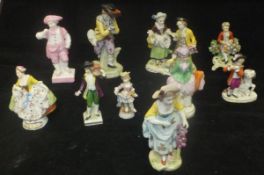 A collection of five Sitzendorf figures,