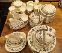 A Royal Doulton "Burgundy" pattern dinner service,