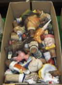 A box containing various mainly Continental pottery and porcelain bottle stops and pourers,