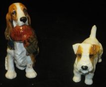 A Royal Doulton figure of "Spaniel with Cock Pheasant" (HN 1001) and another "Sealyham Terrier" (HN