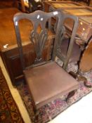 A set of six early 20th Century dining chairs in the Chippendale manner,