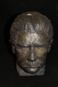 A bronzed plaster head figure by Stanley Doubtfire