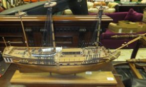 A mid 20th Century hand built wooden model of a three masted sailing vessel