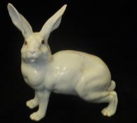 A 20th Century Continental glazed porcelain figure of a "Red-eyed hare", No'd.