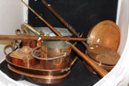 A collection of various copper and brass ware to include two warming pans, a hunting horn,