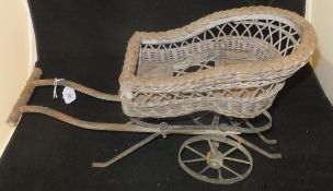 Three Victorian style Phillipino canework and iron dolls' prams (one - base only)