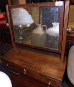 An early 19th Century mahogany toilet mirror, the rectangular plate over three drawers,