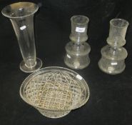 A pair of cut glass candle-light shades,