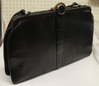 A mid 20th Century Mappin & Webb leather handbag with brass fittings