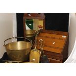 An iron handled brass jam pan, various fire tools,