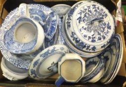 A box of various blue and white ware china and two boxes of various vintage tins