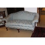 A Wesley Barrell three piece suite comprising two seat sofa in a duck egg blue ground and foliate