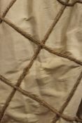 Three pairs of cream shot silk interlined curtains with string lattice decoration