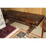 A rectangular hardwood stool and iron bound bench on trestle end supports