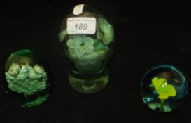 Two Victorian green glass Dumps, one with central thistle decoration,