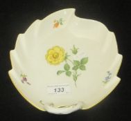 A Meissen leaf-shaped dish decorated with floral sprays bearing impressed No's to base 362-1100 and