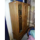 A Victorian satin walnut two door mirrored door wardrobe,