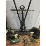 A Victorian style cast iron stick stand, wrought iron fire basket, pair of fire dogs,