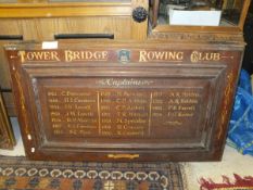 Two Tower Bridge Rowing Club boards,