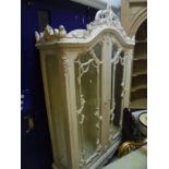 A Continental white painted display cabinet with two glazed doors CONDITION REPORTS