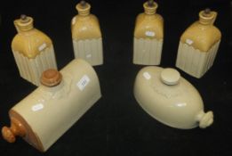 A set of four Victorian stoneware flagons,